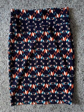 LuLaRoe Navy Pencil Skirt with Orange and Teal Geometric Motif